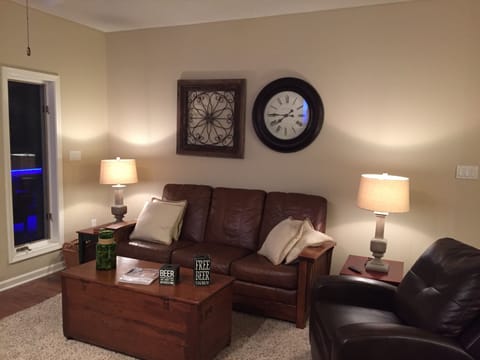 Living room with sleeper sofa  and  two recliners 