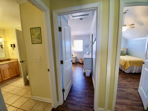 Looking out from the queen and twin bedroom, bathroom to the left