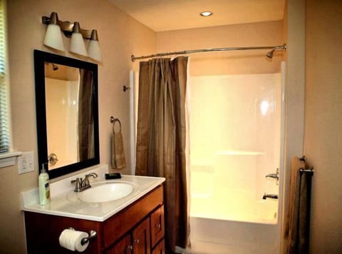 Combined shower/tub, hair dryer, towels, soap