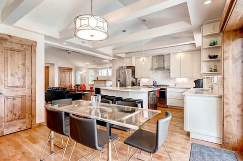 Dining room, with kitchen / kitchen island in background