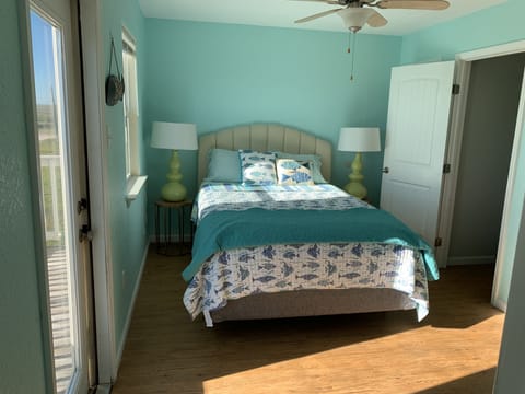 Rear master bedroom with bath .   Ocean views from the bed in “Under the Sea”. 