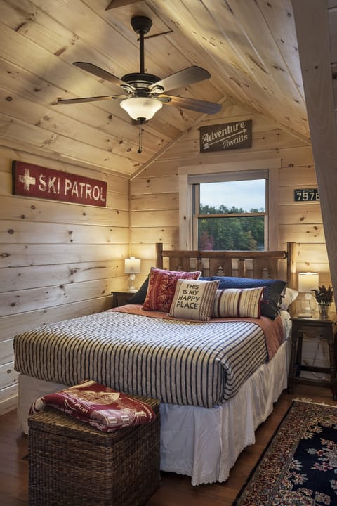 The cabin bedroom! So cozy with a great lake view, smart TV & huge closet