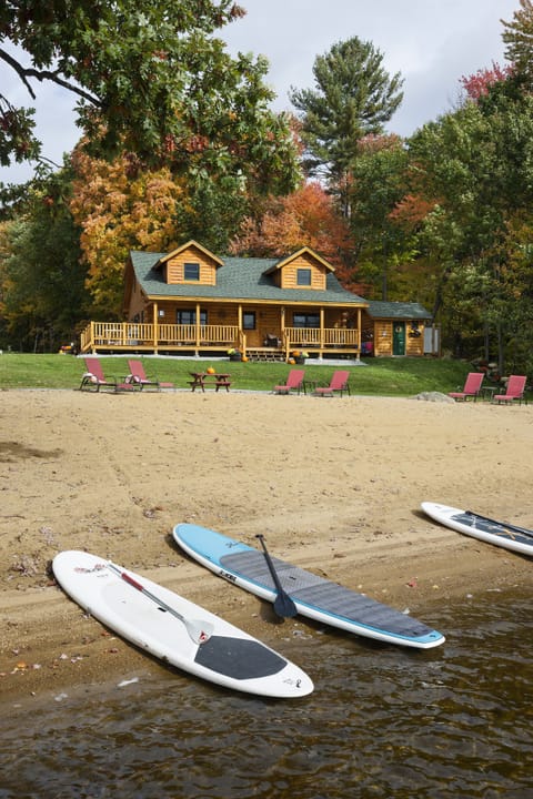 Paddle board on Lake Winnisquam & the beach is just steps away from the cabin