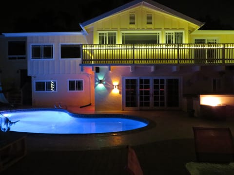 Pool, Patio and Fire Pit at Night 
