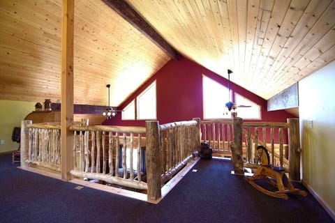 The loft features two queen size beds, and an open concept layout