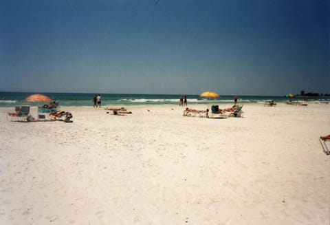 On the beach, sun loungers, beach towels