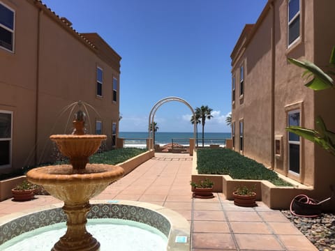 Tranquil fountain and lovely view from patio.