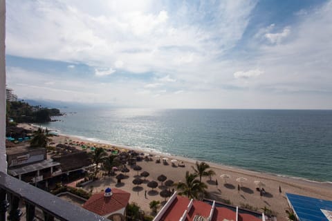 On the beach, sun loungers, beach towels