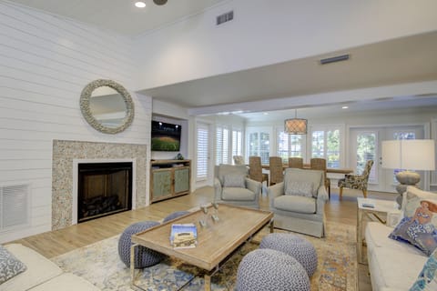 Working gas fireplace and large TV in the family room with comfortable seating