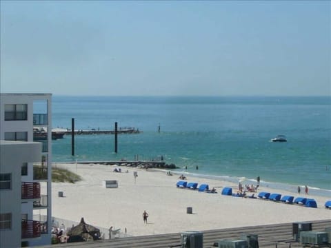 On the beach, sun loungers, beach towels