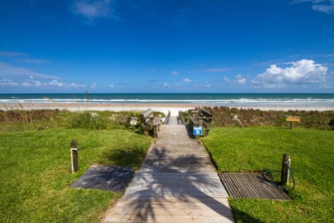 On the beach, sun loungers, beach towels