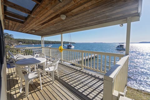 Uninterrupted 180 degree water front views with shared private jetty.