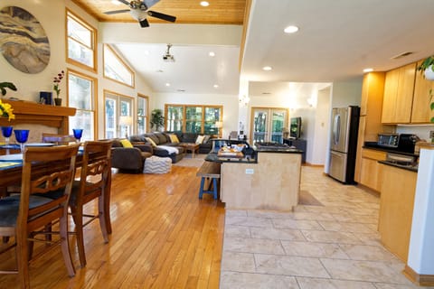 Wonderful space with open, bright floor plan, walls of windows & gourmet kitchen