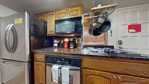 Kitchen with cooking essentials.