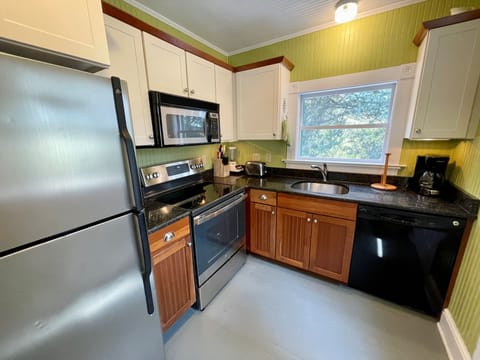 Fridge, microwave, dishwasher, dining tables