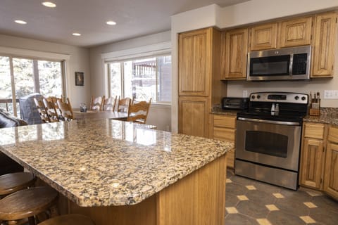 Kitchen into dining room.