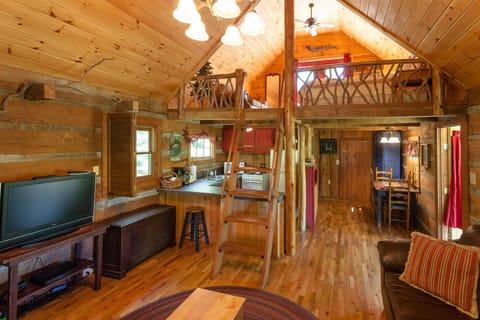 ladder to loft bedroom, TV with satellite and DVD player for convenience.