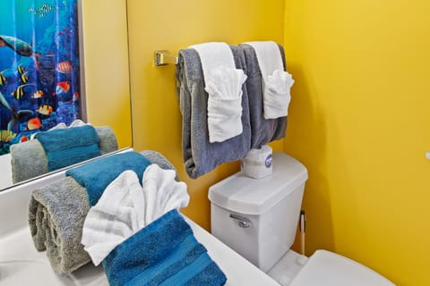 Combined shower/tub, hair dryer, towels, soap