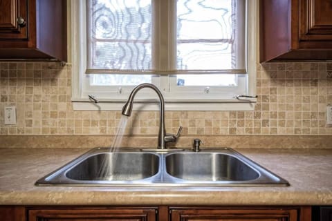 All the fully stocked kitchen conveniences of home