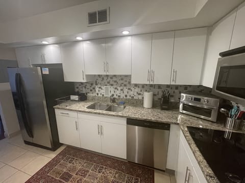Fully stocked kitchen with full size appliances.