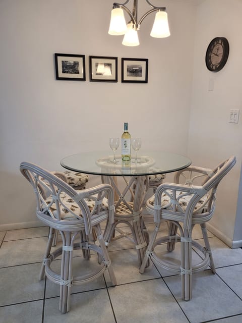 Dining area with counter height table and chairs. 