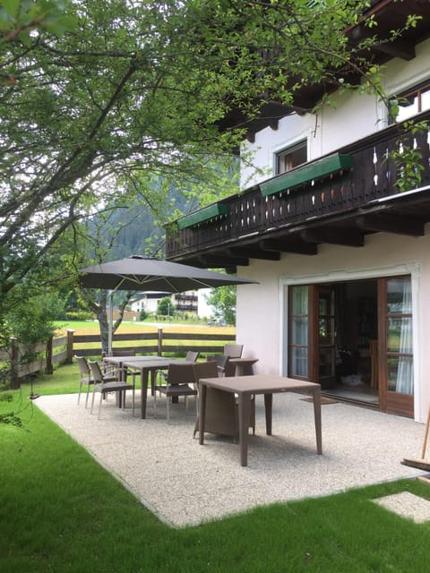 the dining room opens onto a large patio area