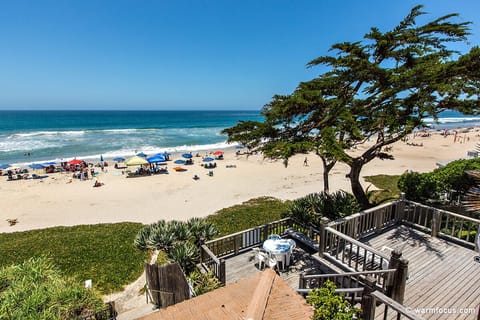 On the beach, sun loungers, beach towels