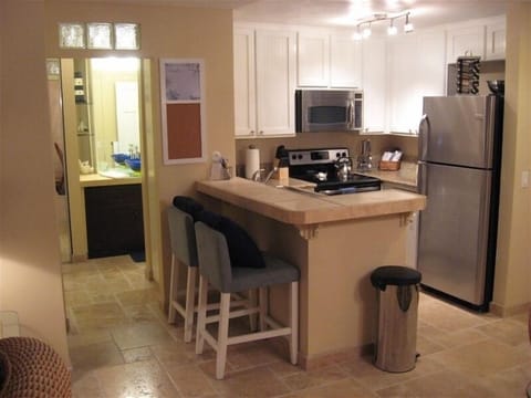 Remodeled kitchen with all new stainless steel appliances and granite countertop