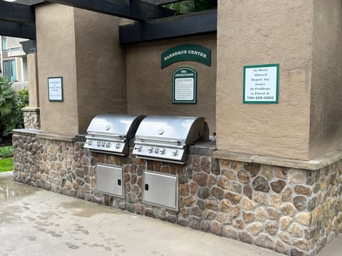 BBQ/Grilling terrace above the main pool. It has picnic table seating for 12.