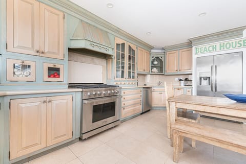 The kitchen comes stocked w/ dishes, utensils, cookware, bakeware, and all major and small appliances.