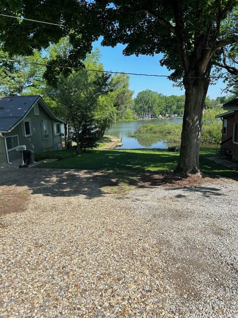 Gravel drive leading you to the parking area