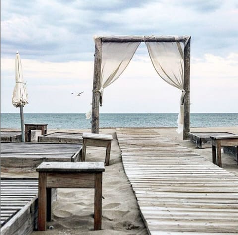 On the beach, sun loungers