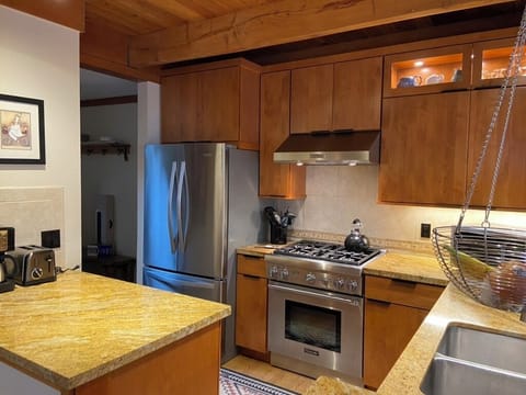 Cook gourmet meals in well-Equipped kitchen.