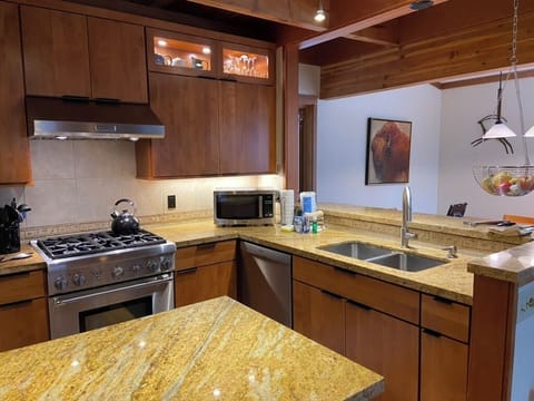 Kitchen recently remodeled with commercial range, lovely cabnetry.