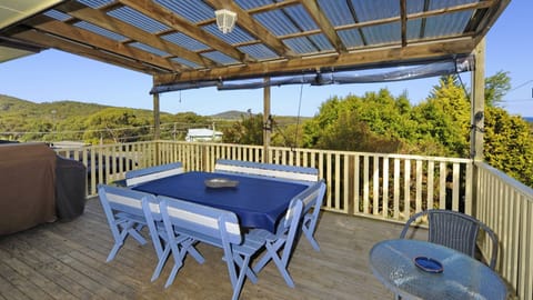 spacious front deck with views to the beach and ocean