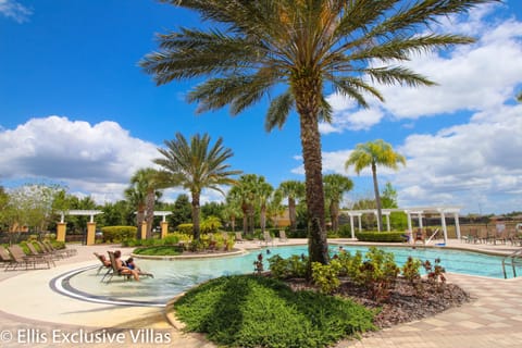 A heated pool, sun loungers