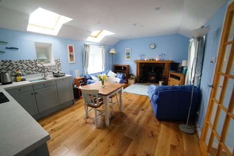 The living room is spacious and warm