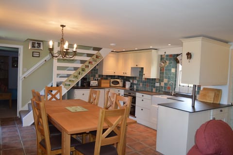 solid oak dining in modern kitchen
