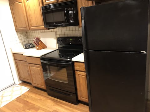 Oven, stovetop, blender, dining tables