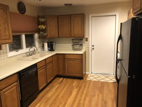 Oven, stovetop, blender, dining tables