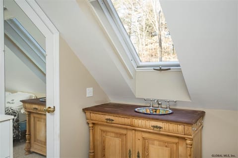 Bathtub, jetted tub, hair dryer, towels