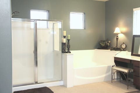 Combined shower/tub, hair dryer, towels, soap