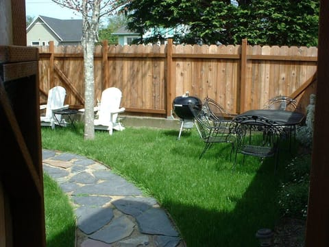 Private enclosed yard for your use including grill.
