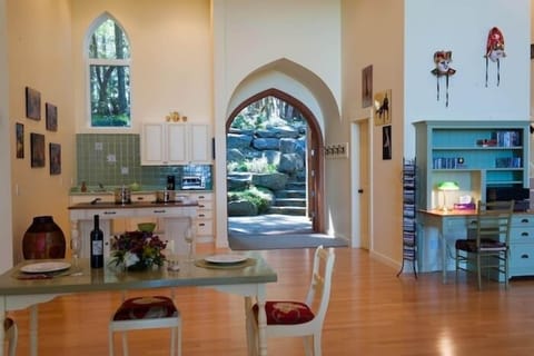 View from the dining area with wide open front doors.
