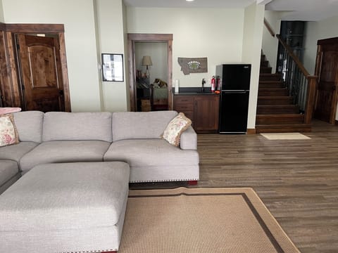 Downstairs family room with wet bar and fridge