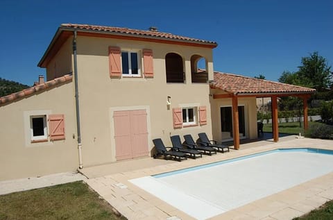 A heated pool, sun loungers