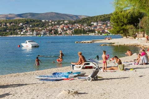 Beach nearby, sun loungers