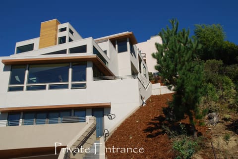 The property and the rental unit's private entrance and deck