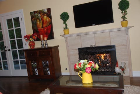 Read a cookbook or travel guide from the bookshelves while in front of the fire.