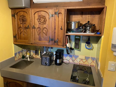 Fridge, microwave, stovetop, coffee/tea maker